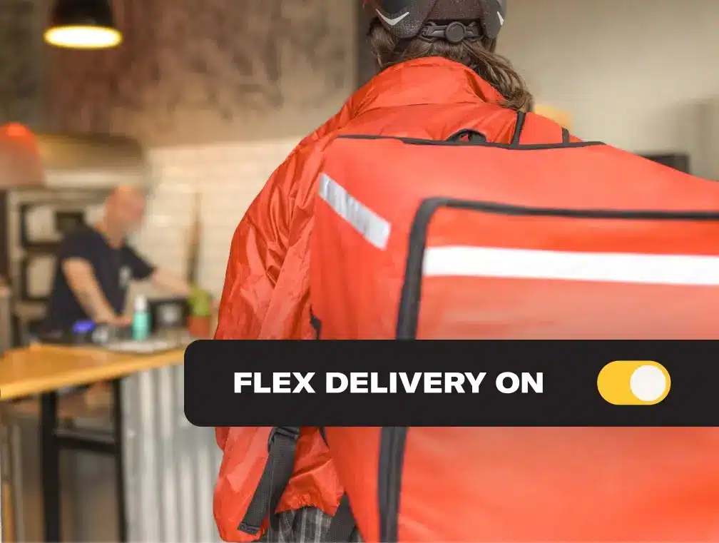 On-demand delivery driver collecting a restaurant order through Slice Flex Delivery